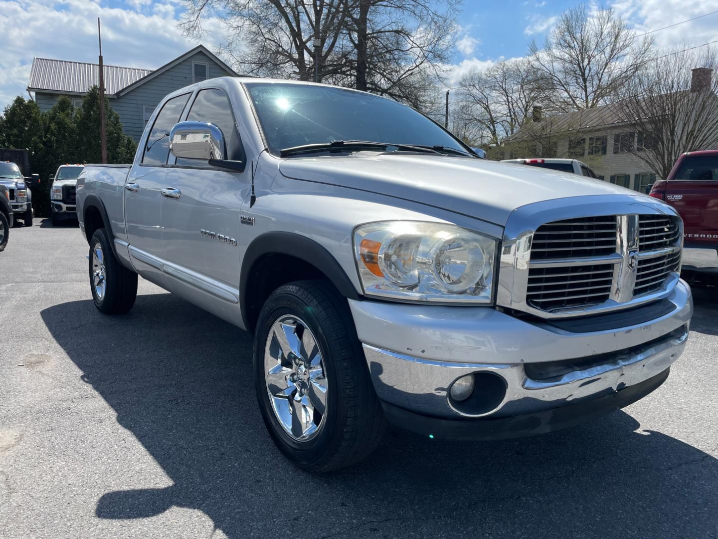 2007 silver Dodge Ram 1500 Laramie Quad Cab 4WD (1D7HU18267S) with an 5.7L V8 OHV 16V engine, 5-Speed Automatic Overdrive transmission, located at 101 N. Main Street, Muncy, PA, 17756, (570) 546-5462, 41.207691, -76.785942 - Photo#1